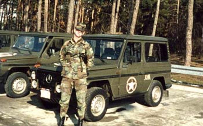 apr0203_TS8.jpg - Todd Stach - E Troop - Camp Lee - 1986 - Todd Stach by the Mercedes " G " type vehicles used for border operations.