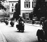 A Kradschutzen company traveling on Martin Luther Strasse. A Kradschutzen company traveling on Martin Luther Strasse.