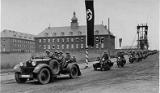 A Kradschutzen company departs the Kaserne during the parade. The scaffold around the monolith is clearly visible. This battalion would soon depart Manteuffel, however, to participate in the Anchluss of Austria with the parent 2nd Panzer Division. A Kradschutzen company departs the Kaserne during the parade. The scaffold around the monolith is clearly visible. This battalion would soon depart Manteuffel, however, to participate in the Anchluss of Austria with the parent 2nd Panzer Division.
